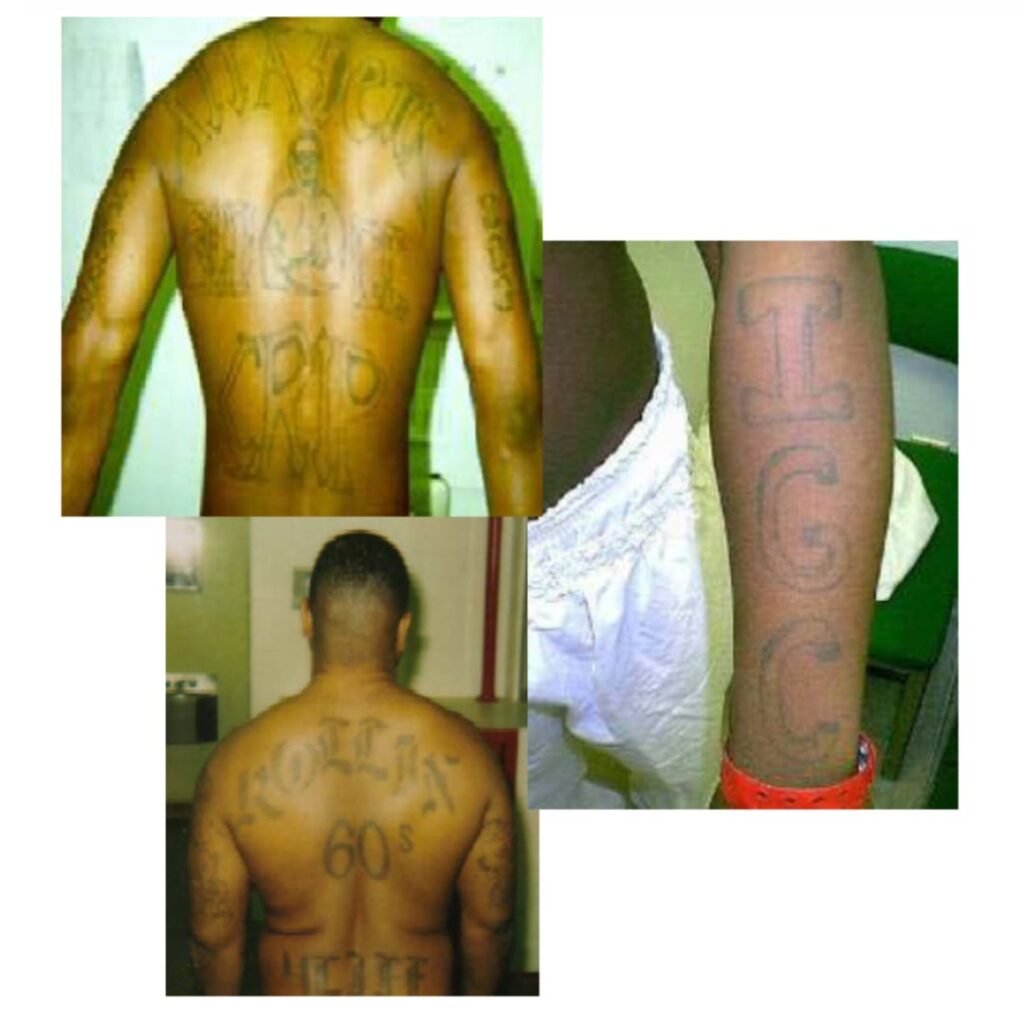 Gang name tatted on body
