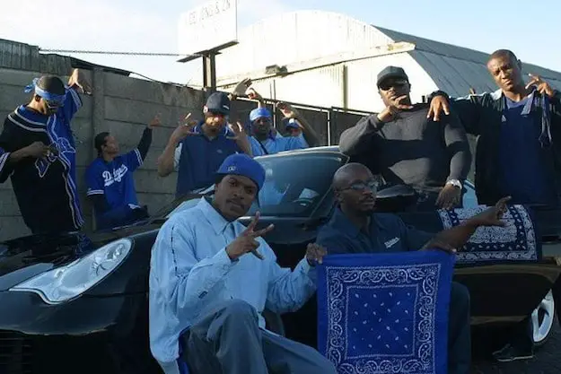 A gang flexing with blue color clothing
