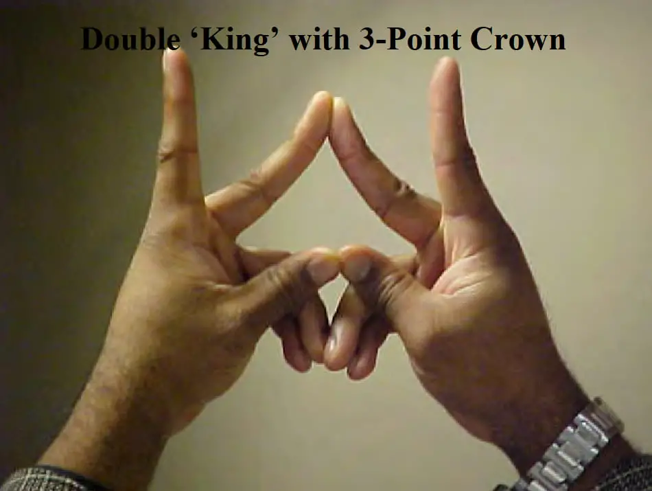 Double king with three point crown gang sign