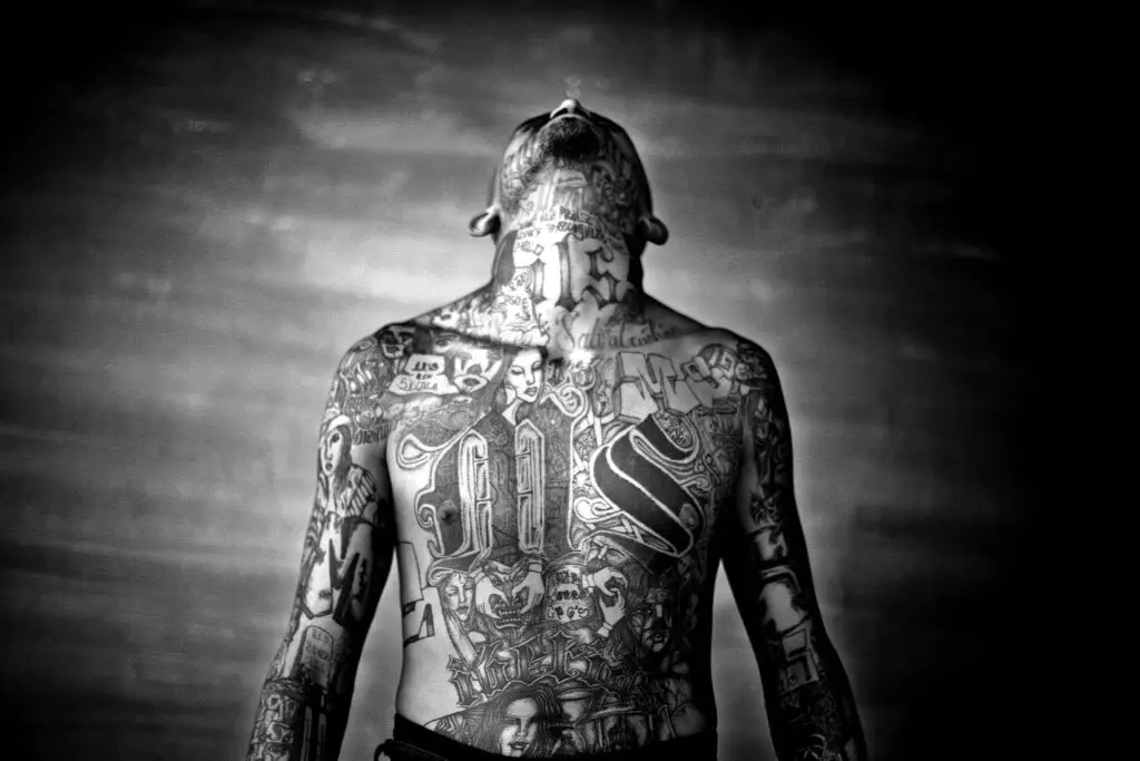 Mara Salvatrucha member showing his completely tatted up body