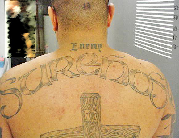 Surenos tatted on back