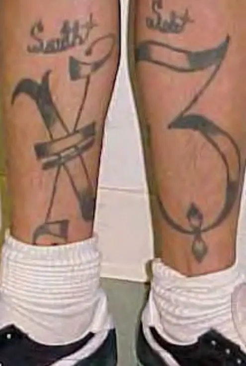 X3 tatted on legs
