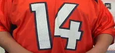 t shirt with number 14 on back
